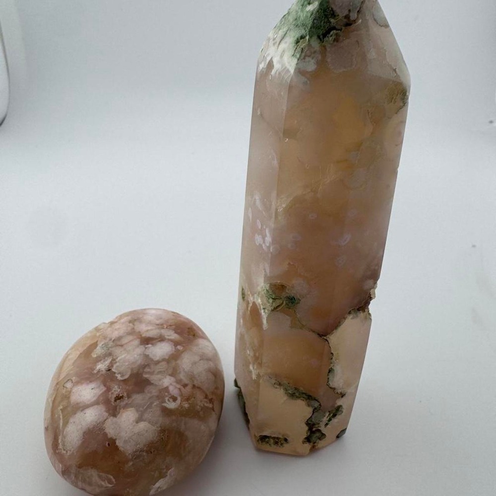 Flower Agate tower and oval palm stone